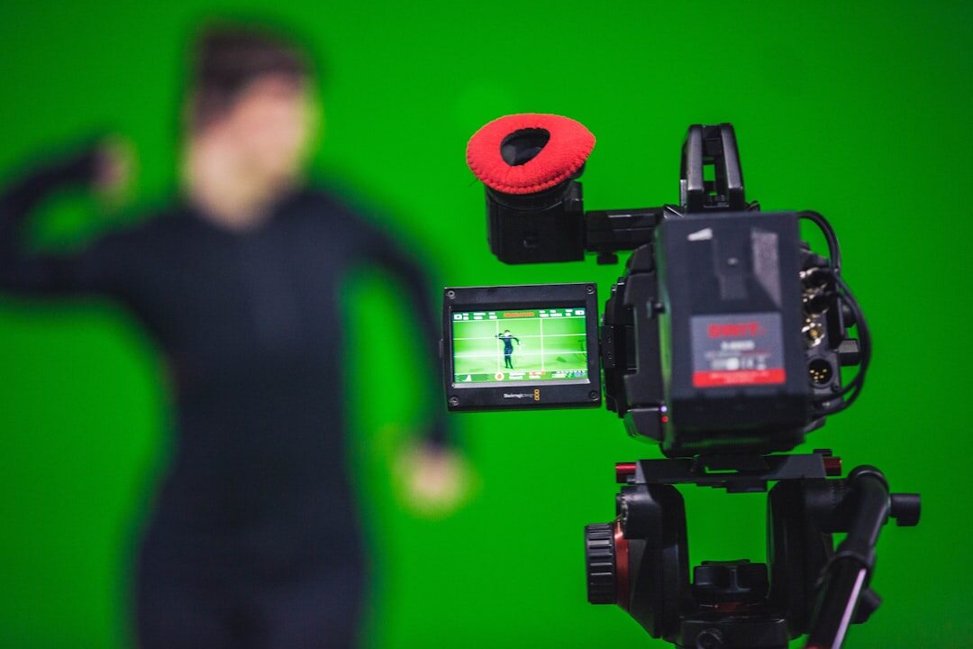 Virtual studio setup with camera facing a presenter in front of a green screen